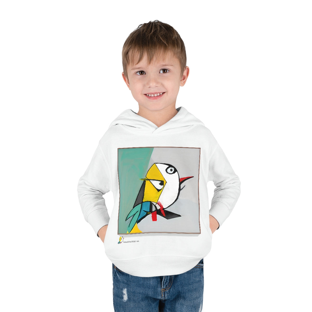 A boy wearing the Rare Cubist Bird toddler pullover fleece hoodie in White