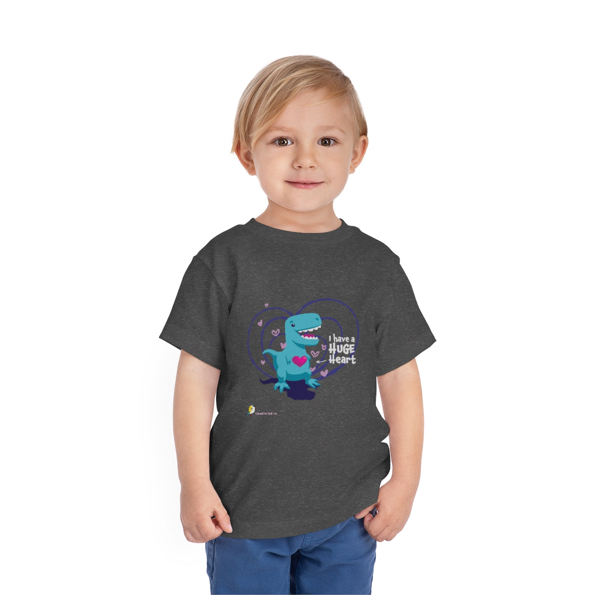 A child wearing the I Have a Huge Heart toddler t-shirt in Dark Heather Grey