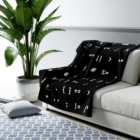 A chic and cozy blanket introducing code to kids, to spark an interest in math and software, smart STEM gift featuring symbols used in programming languages